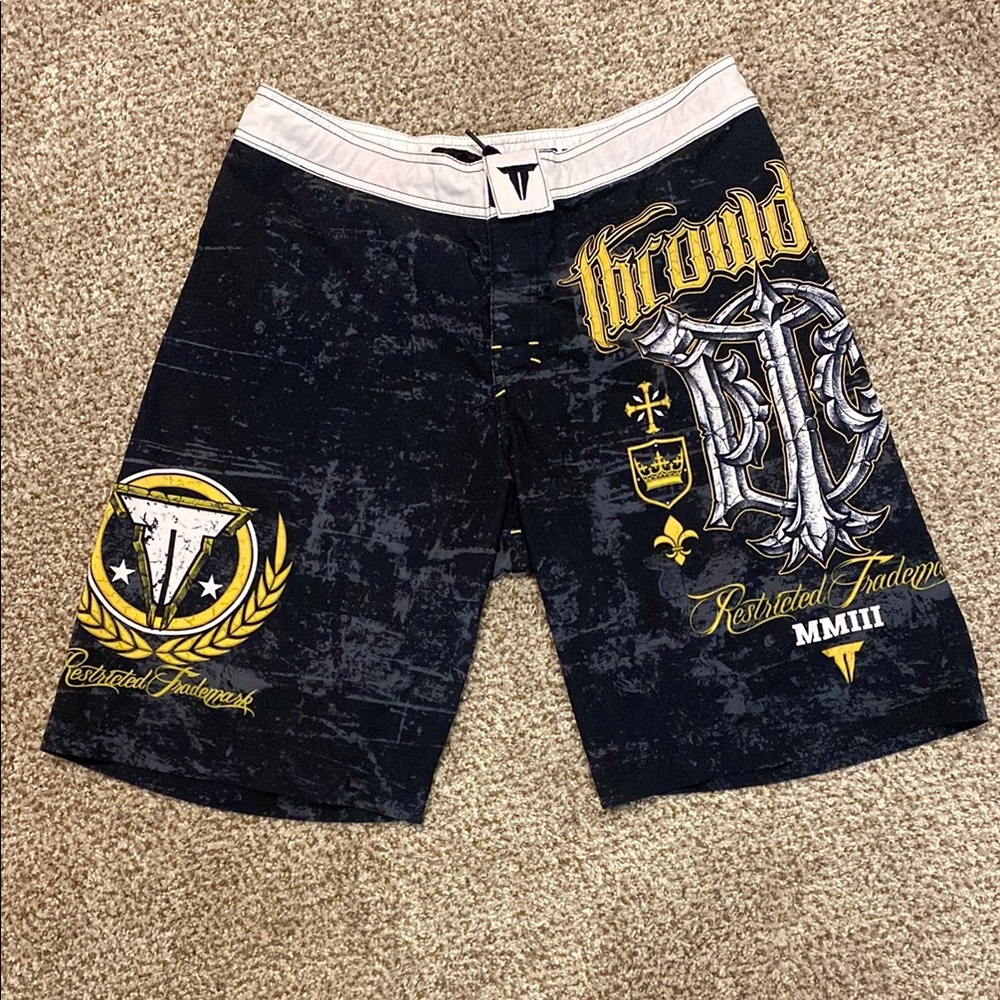 Throwdown Black & Gold Graphic Restricted Trademark Men’s Board Shorts. Size 33